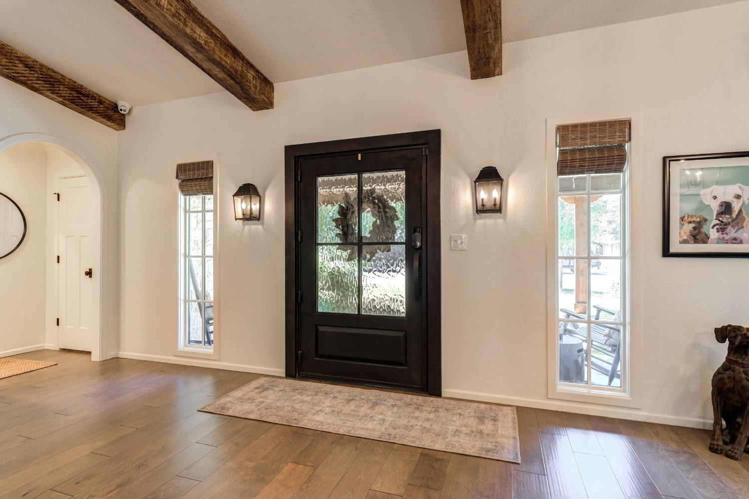 4520 8th Street Lubbock, TX 79416 - Photo 5 of 49 a view of an empty room with wooden floor and a window
