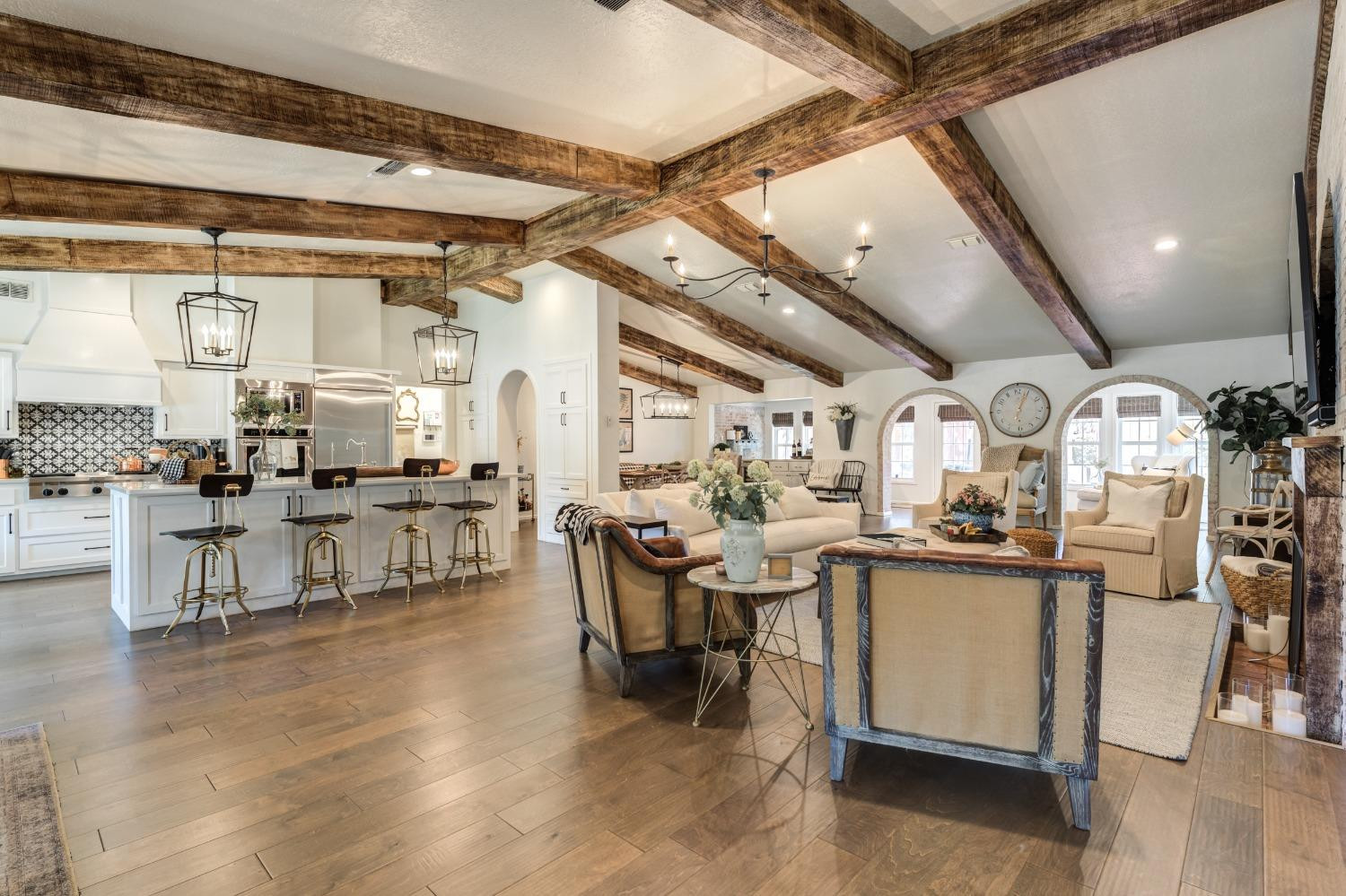 4520 8th Street Lubbock, TX 79416 - Photo 6 of 49 a kitchen with lots of counter top space and painting on the wall
