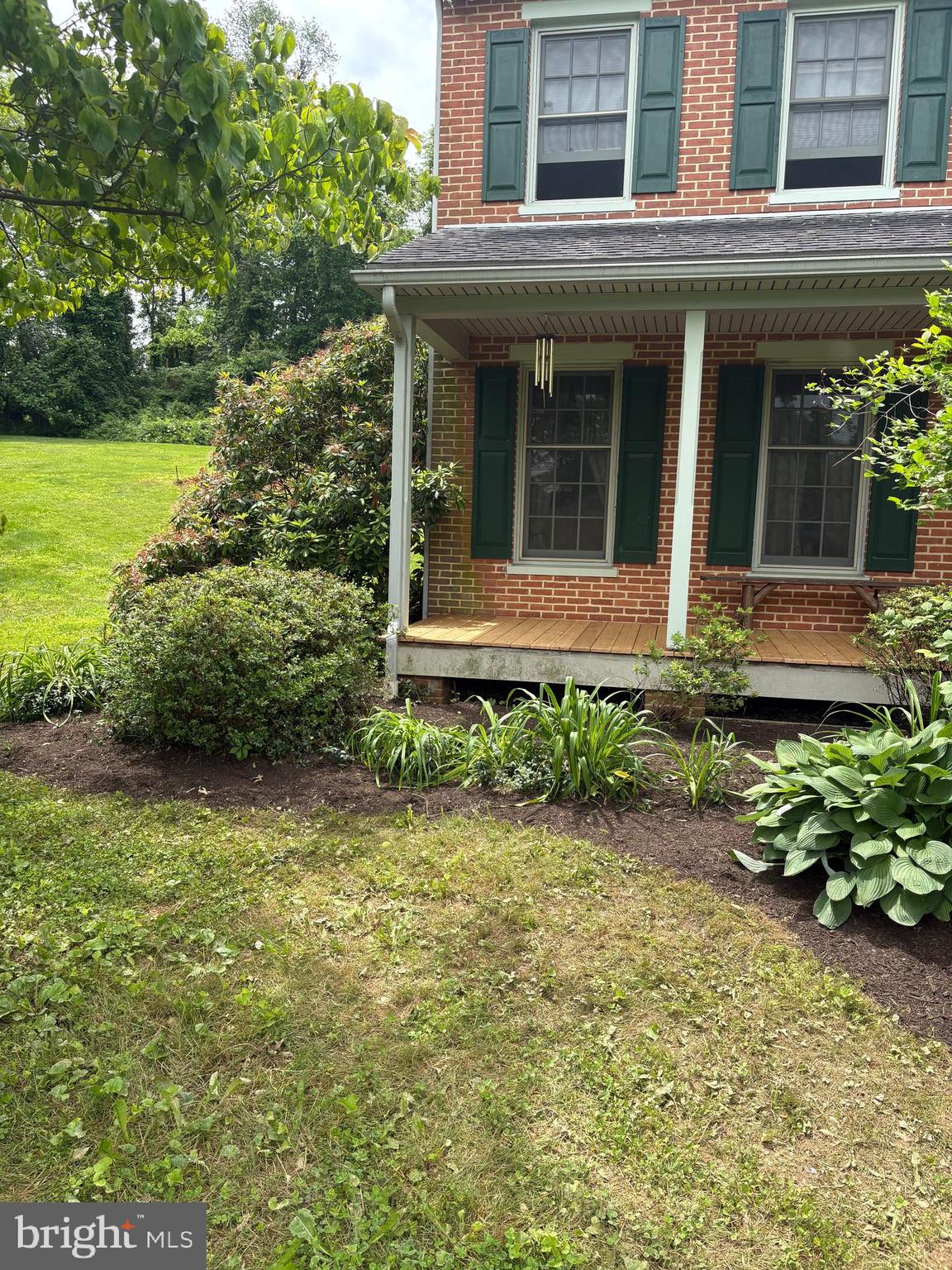 184 Pittsburg Valley Road Conestoga, PA 17516 - Photo 3 of 10 a front view of a house with garden