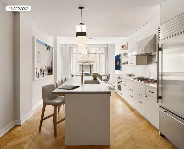 a kitchen with stainless steel appliances kitchen island granite countertop a sink and a refrigerator