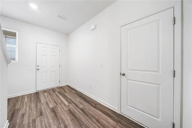 a view of small space with wooden floor