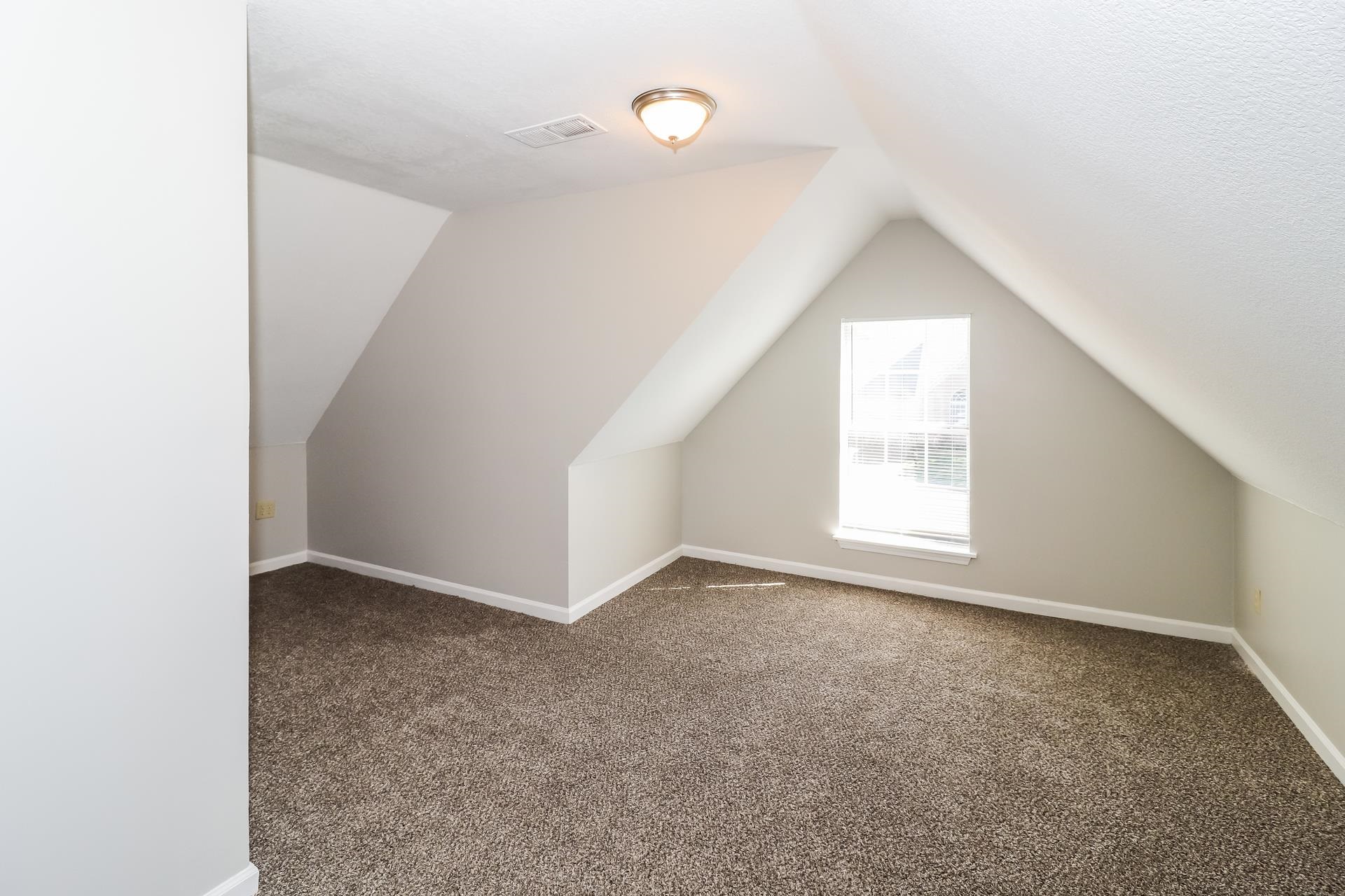 8112 Country Mill Cove Memphis, TN 38016 - Photo 11 of 17 an empty room with windows