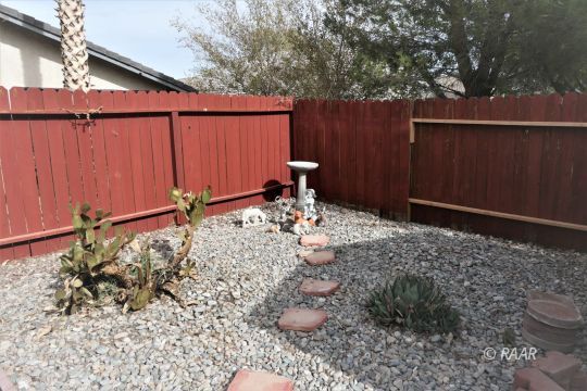 412 Veada Avenue Ridgecrest, CA 93555 - Photo 32 of 35 a view of a backyard of the house