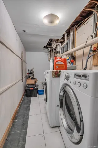 a room with furniture and a flat screen tv