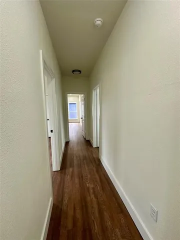 a bathroom with a toilet sink and shower