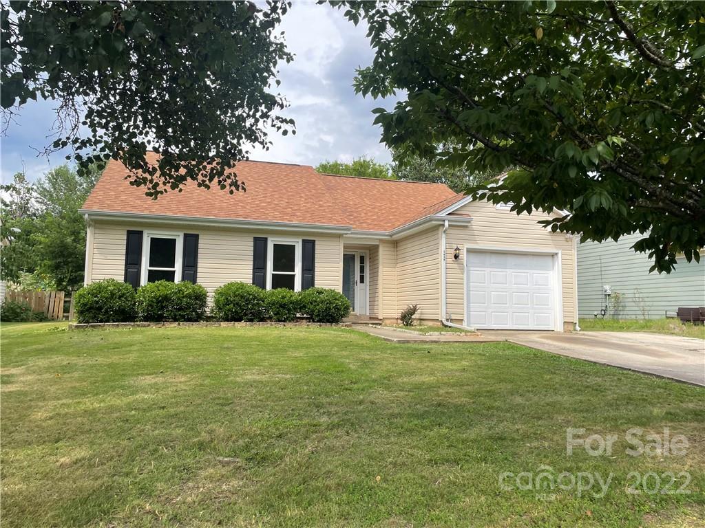 1639 Crestdale Road Rock Hill, SC 29732 - Photo 1 of 8 a front view of a house with a garden