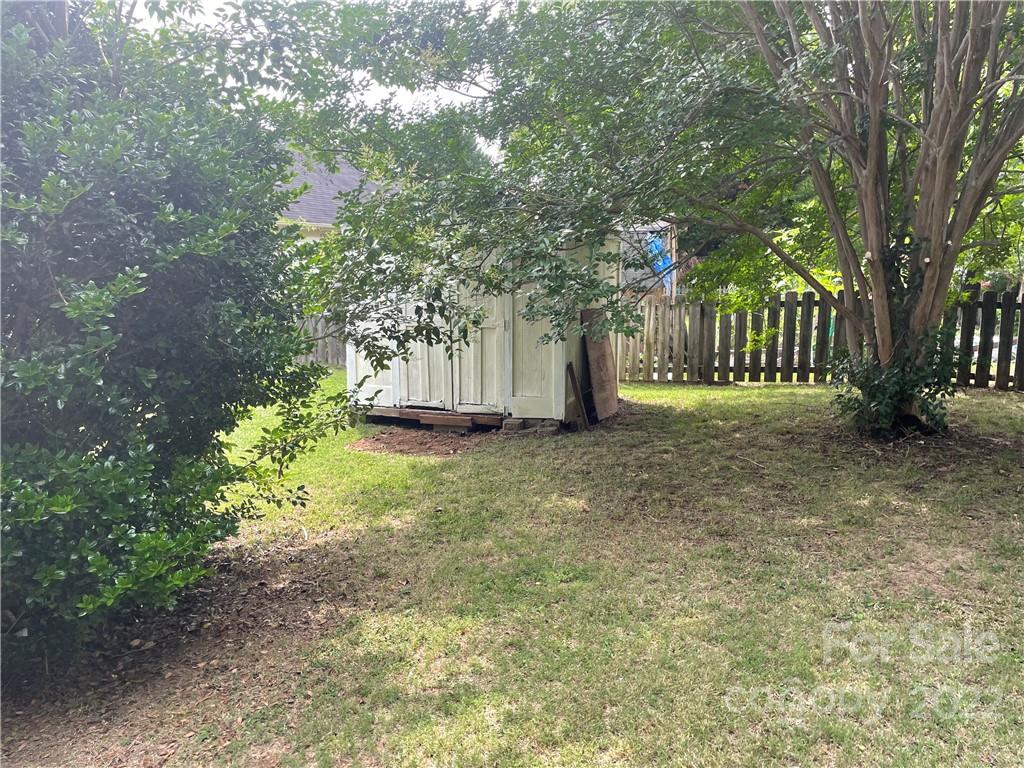1639 Crestdale Road Rock Hill, SC 29732 - Photo 2 of 8 a view of a yard with plants and trees