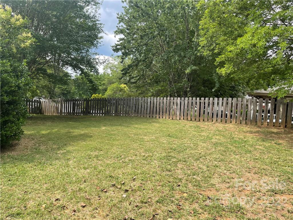 1639 Crestdale Road Rock Hill, SC 29732 - Photo 3 of 8 a view of a backyard with a garden