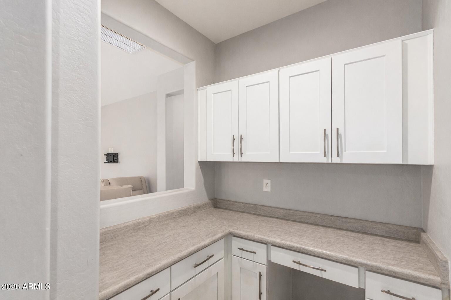 41609 West Summer Wind Way Maricopa, AZ 85138 - Photo 20 of 40 a view of cabinets and window