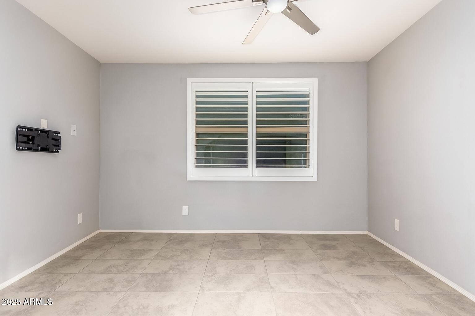 41609 West Summer Wind Way Maricopa, AZ 85138 - Photo 26 of 40 a view of an empty room with a window