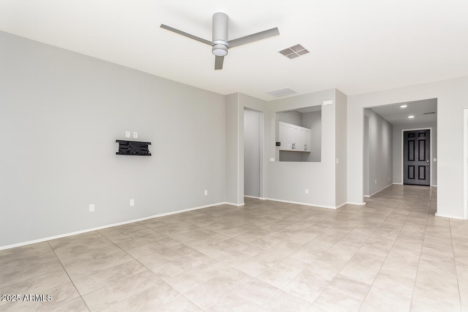 41609 West Summer Wind Way Maricopa, AZ 85138 - Photo 9 of 40 a view of a livingroom with a ceiling fan
