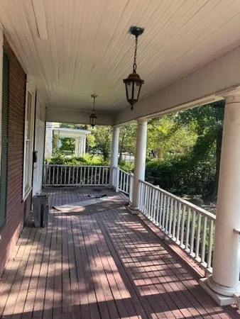 a view of porch with wooden floor and outdoor space