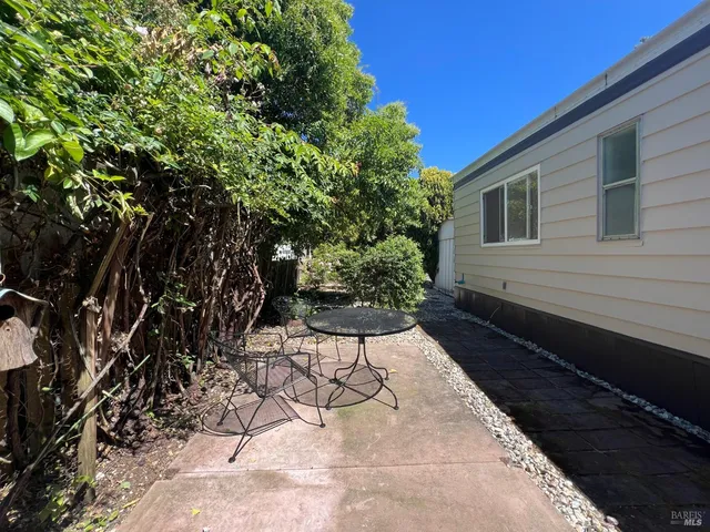 a backyard of a house with lots of green space