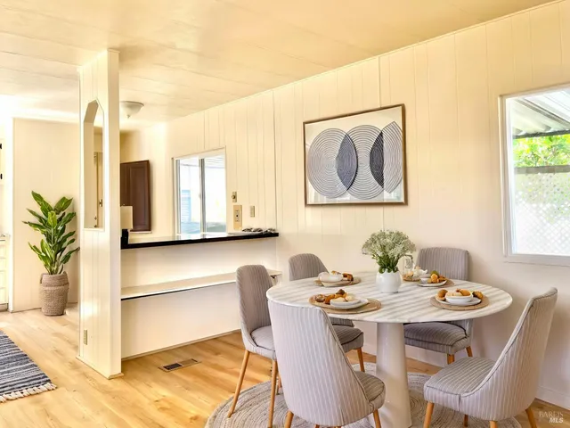 a view of a dining room with furniture