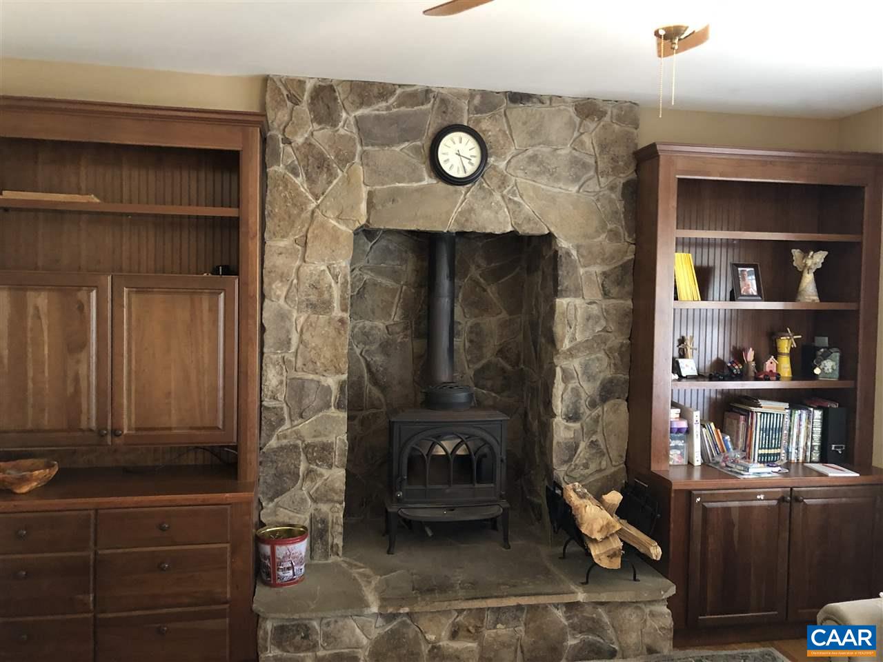 3285 Hardware River Road Charlottesville, VA 22903 - Photo 11 of 22 a living room with furniture and a fireplace
