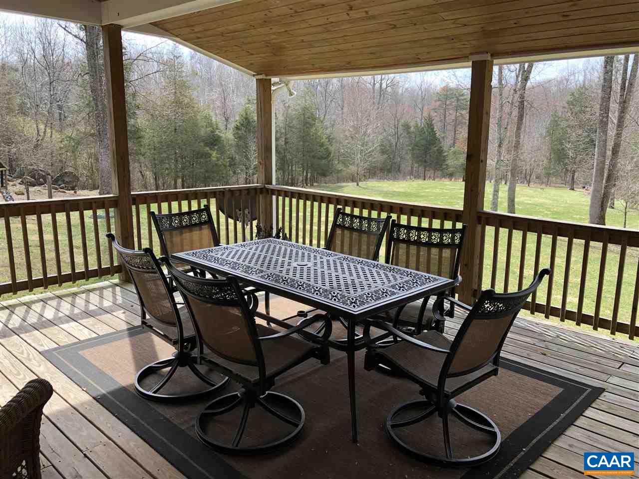 3285 Hardware River Road Charlottesville, VA 22903 - Photo 16 of 22 a view of a chairs and table in the roof deck