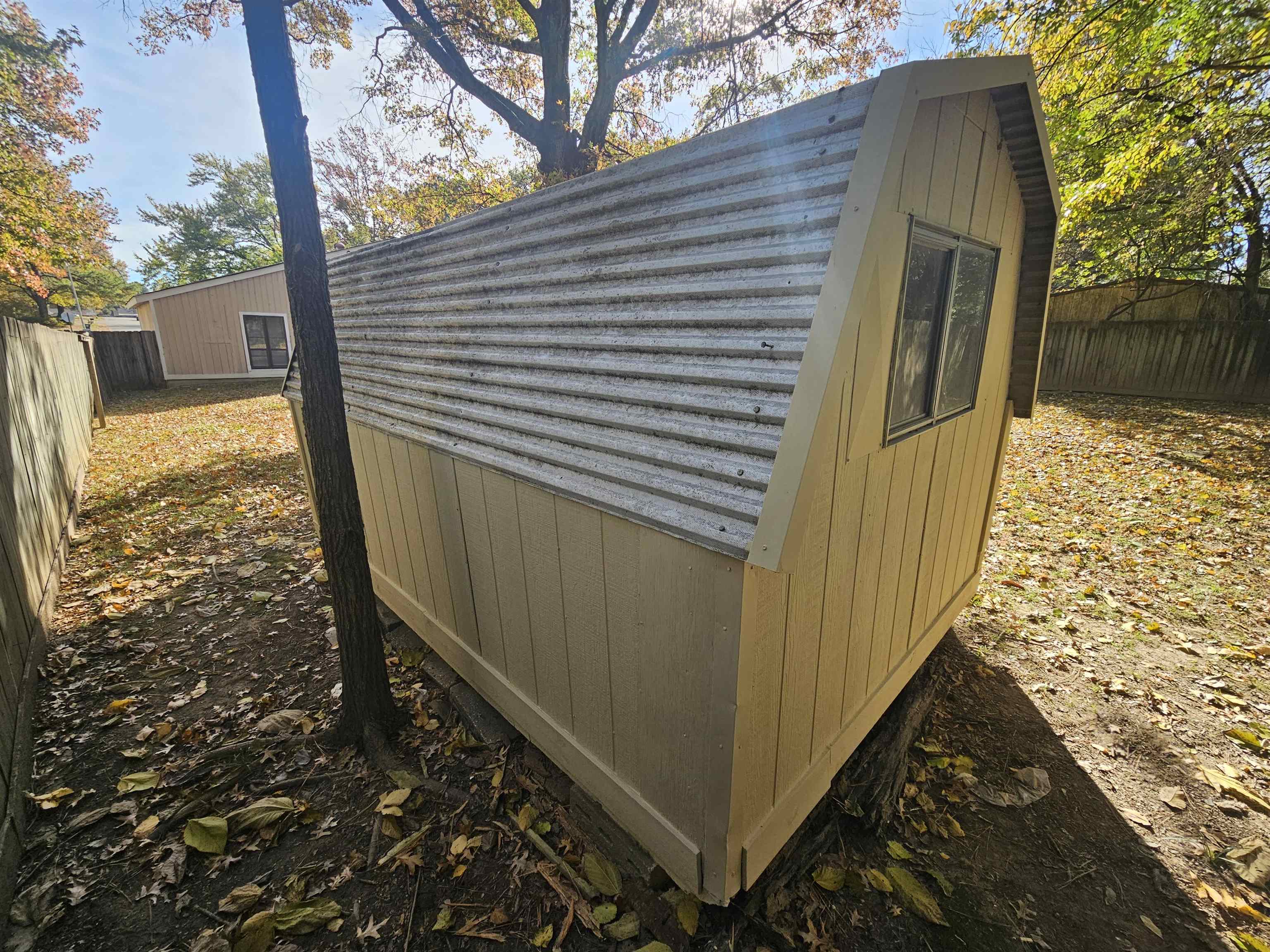 4073 Silverleaf Road Memphis, TN 38115 - Photo 17 of 17 a view of a house with a tree beside it