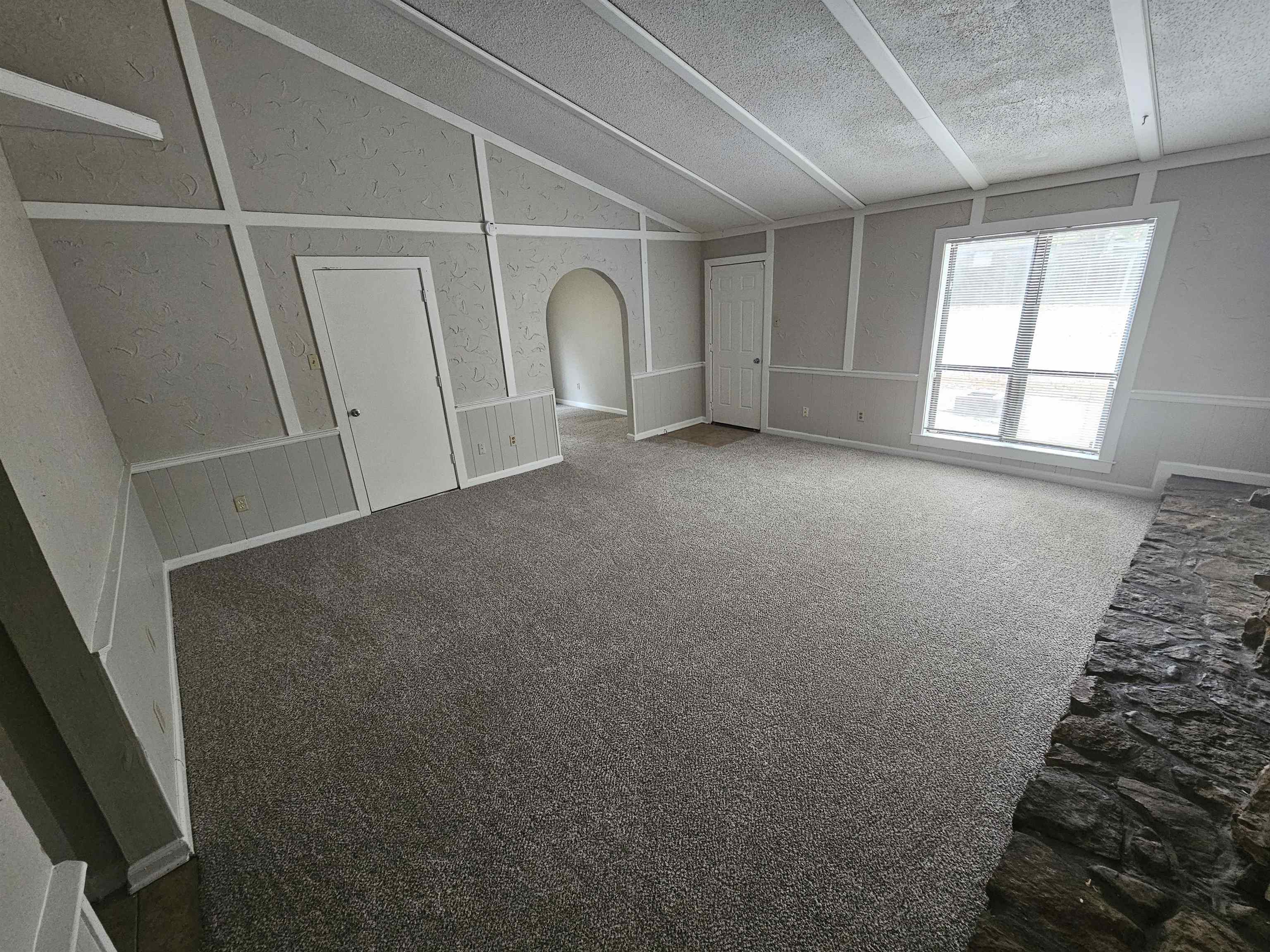 4073 Silverleaf Road Memphis, TN 38115 - Photo 2 of 17 an empty room with windows