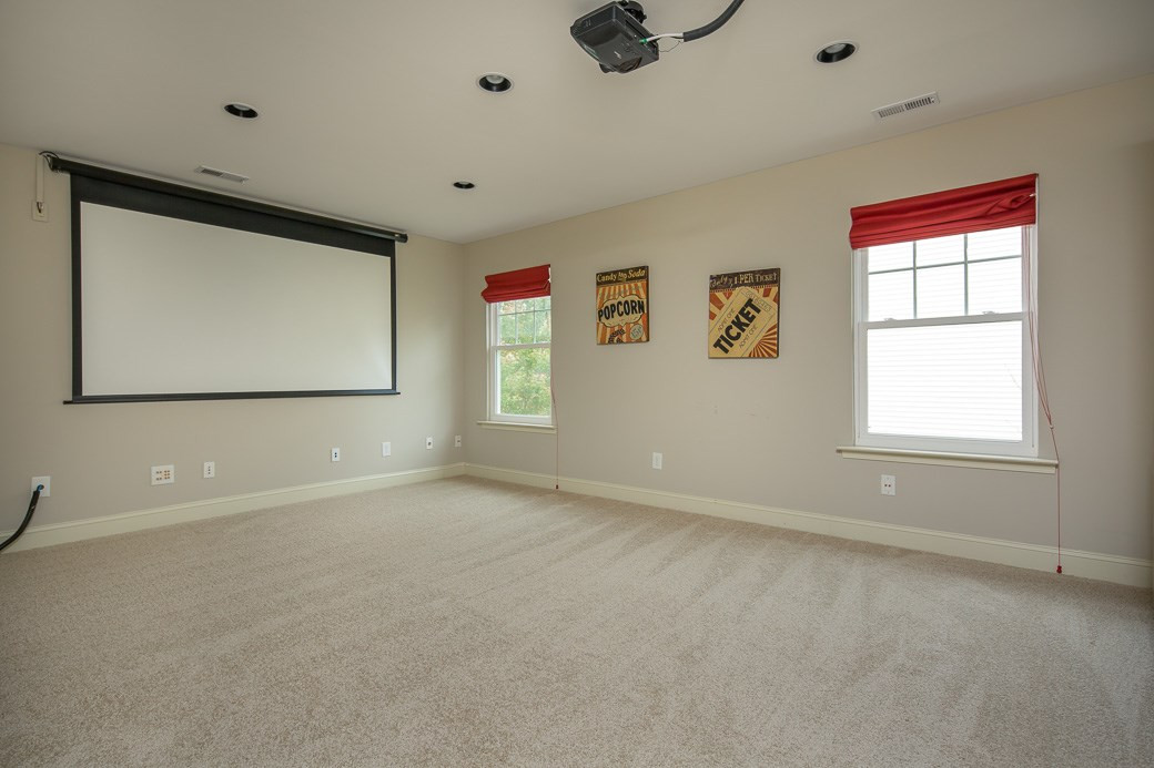 159 Locke Woods Road Raleigh, NC 27603 - Photo 9 of 17 Large secondary bedrooms! 4th bedroom/bonus room can be a home movie theater equipped with dim-able recessed lighting. 100 inch projector screen and a 1080p projector! Media Room