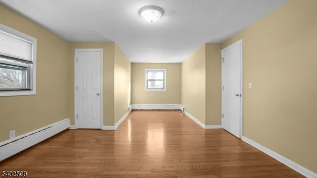 a view of livingroom with hardwood floor and window