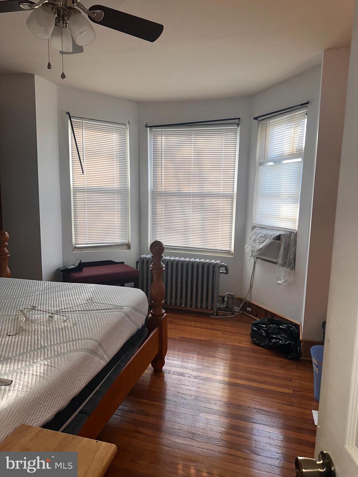 1101 Parker Street Chester, PA 19013 - Photo 12 of 15 a bedroom with a bed and a window