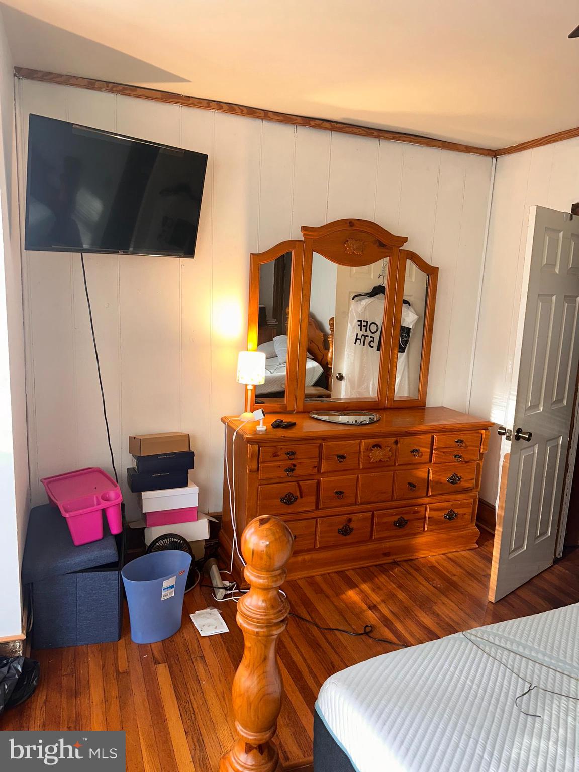 1101 Parker Street Chester, PA 19013 - Photo 14 of 15 a living room with furniture and a flat screen tv