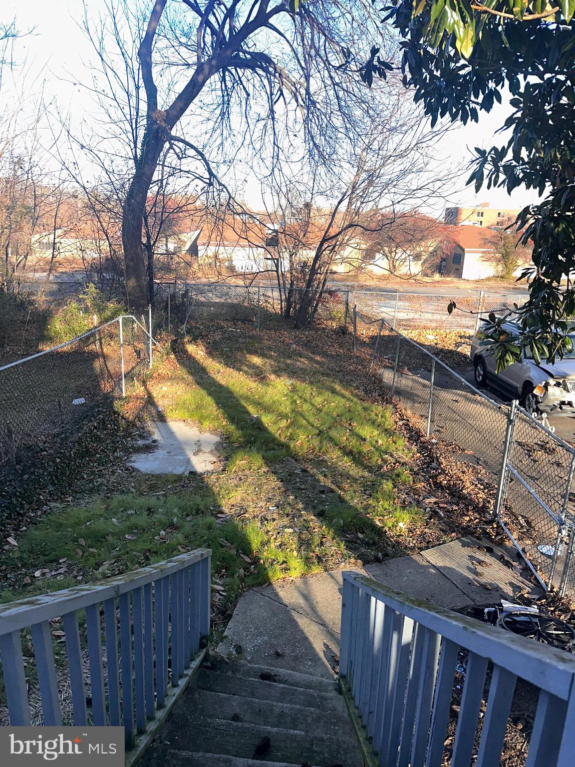 1101 Parker Street Chester, PA 19013 - Photo 15 of 15 a view of a yard with wooden fence