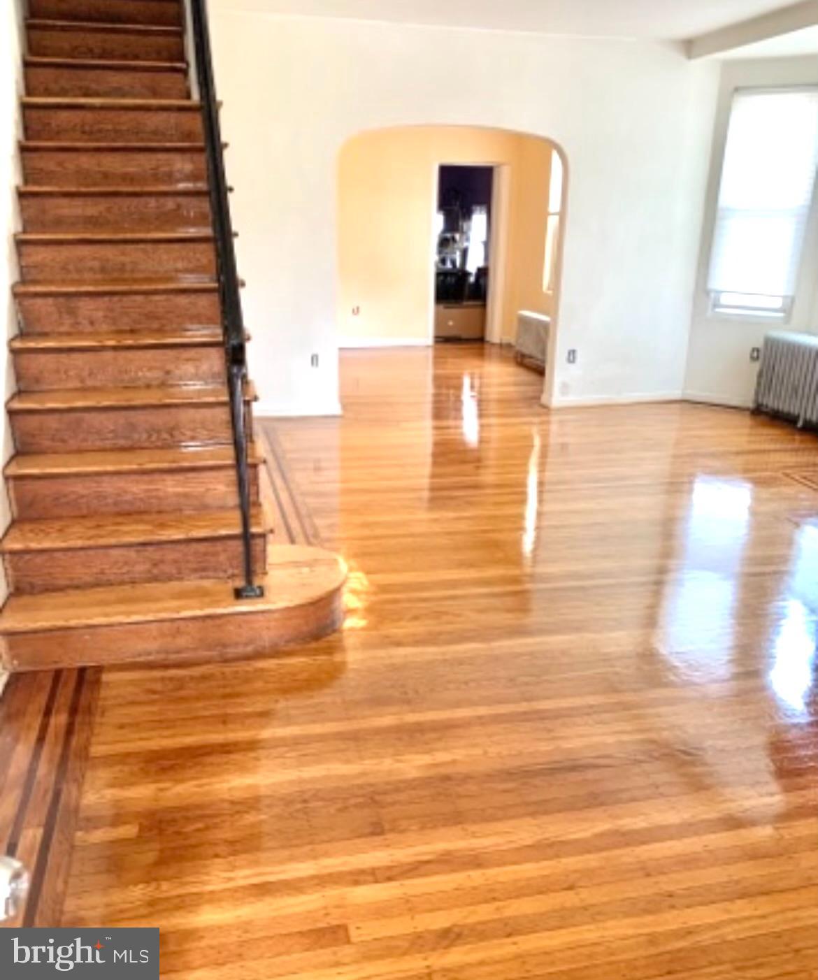1101 Parker Street Chester, PA 19013 - Photo 2 of 15 a view of entryway and hall with wooden floor