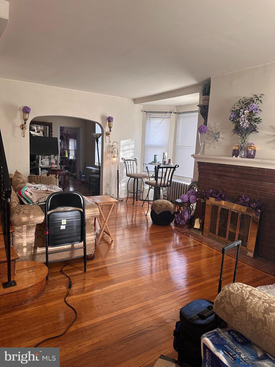 1101 Parker Street Chester, PA 19013 - Photo 4 of 15 a living room with furniture and a wooden floor