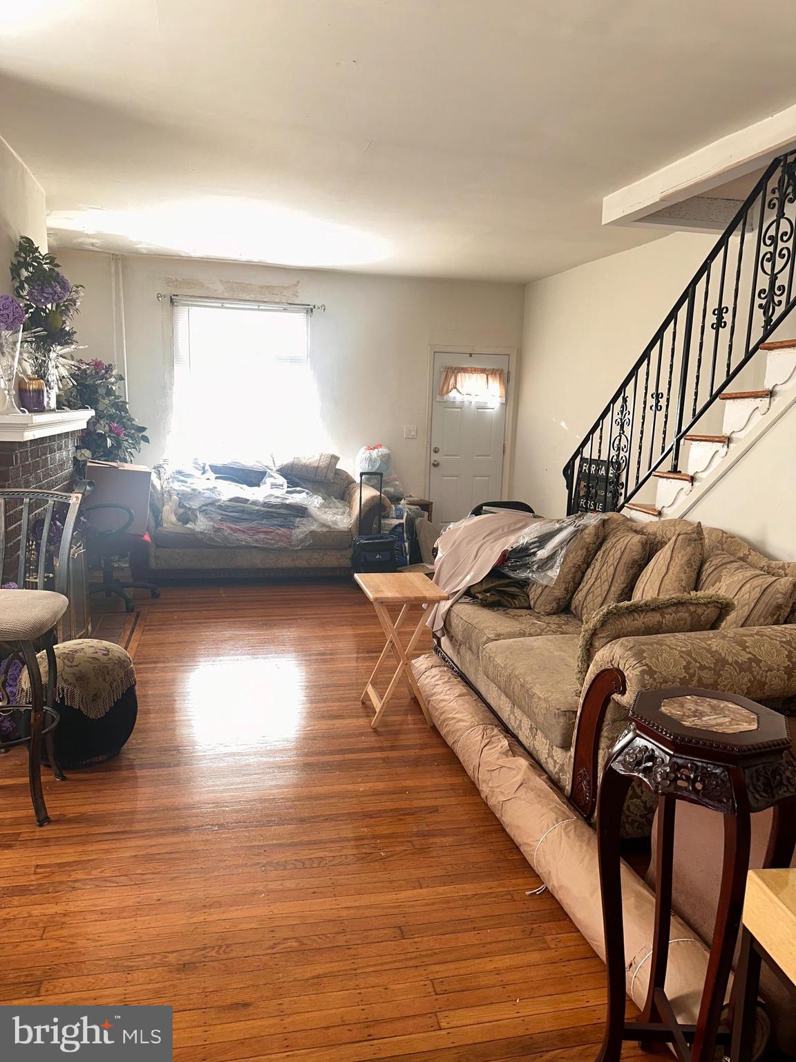 1101 Parker Street Chester, PA 19013 - Photo 5 of 15 a living room with furniture and a wooden floor
