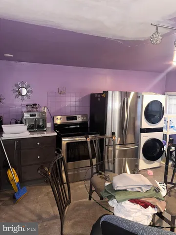 a room with furniture and a flat screen tv