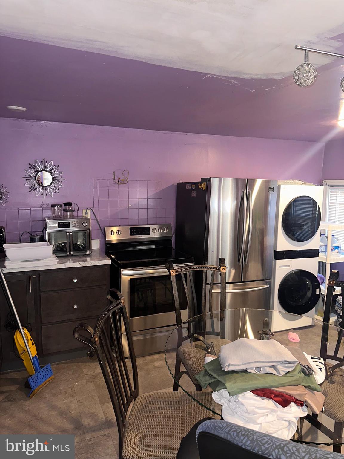 1101 Parker Street Chester, PA 19013 - Photo 6 of 15 a room with furniture and a flat screen tv