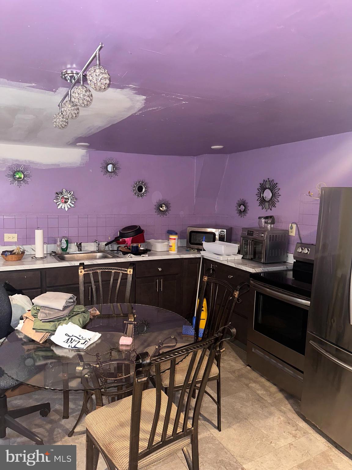 1101 Parker Street Chester, PA 19013 - Photo 7 of 15 a view of a dining room with furniture