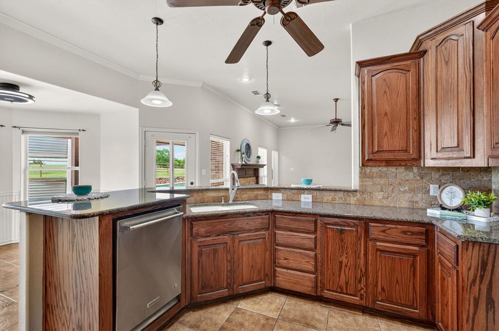 2828 Bennett Road Howe, TX 75459 - Photo 11 of 39 a kitchen with sink and cabinets