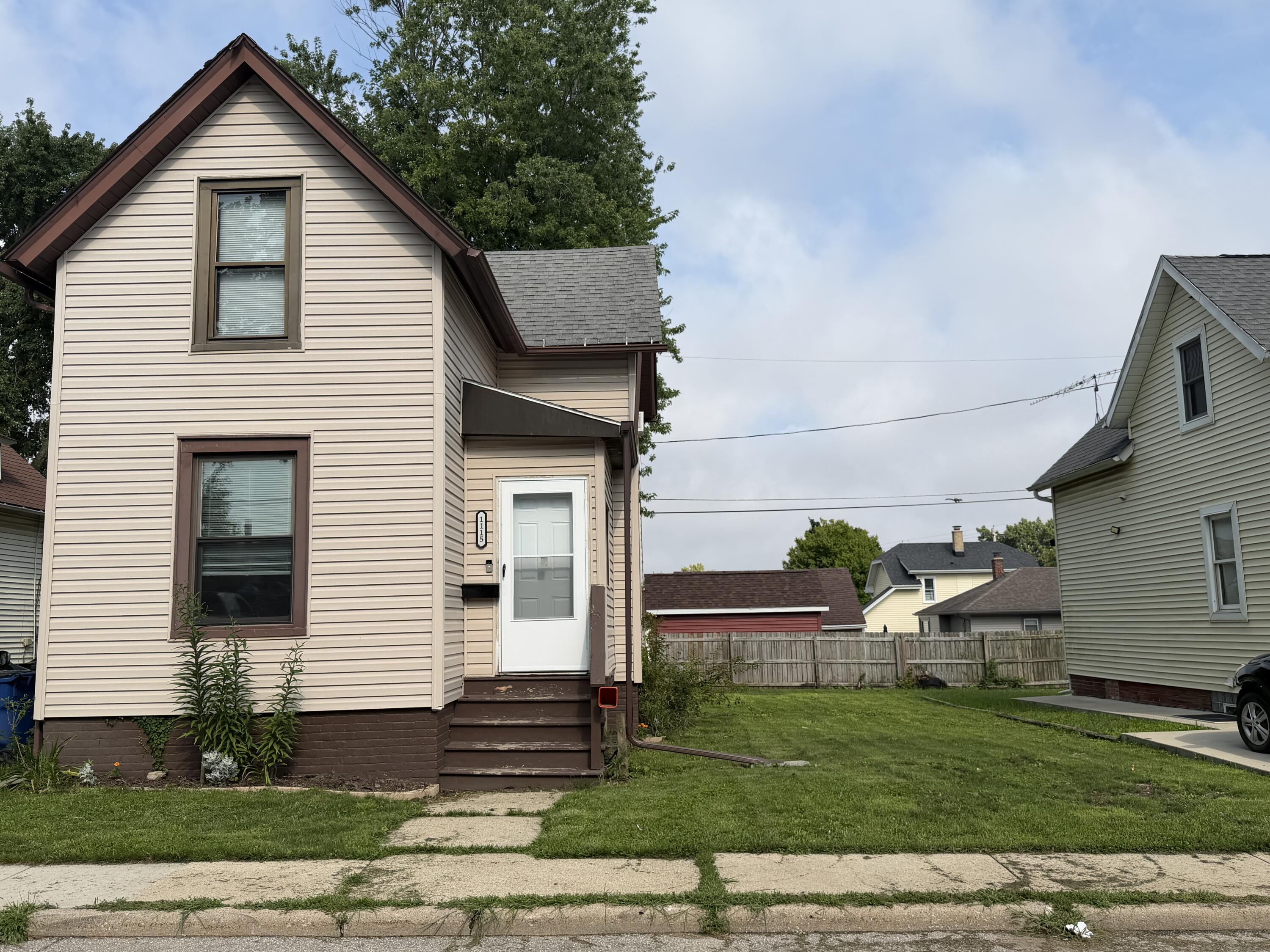 1115 Lewis Street Racine, WI 53404 - Photo 2 of 23 Front and side yard