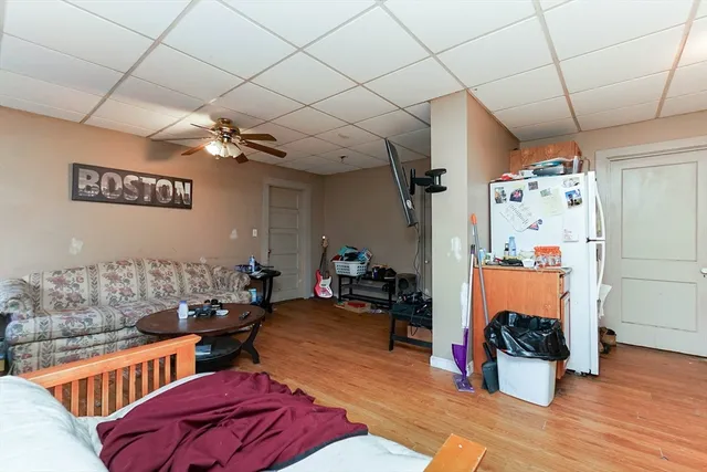 a room with furniture and a chandelier