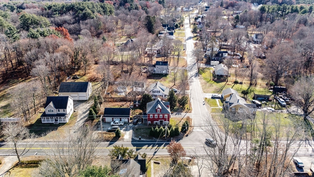 479 Main Street Hanson, MA 02341 - Photo 4 of 39 an aerial view of a houses with yard