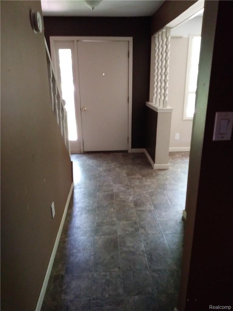 18135 West Brant Road Brant, MI 48614 - Photo 6 of 12 hallway to front door.jpg