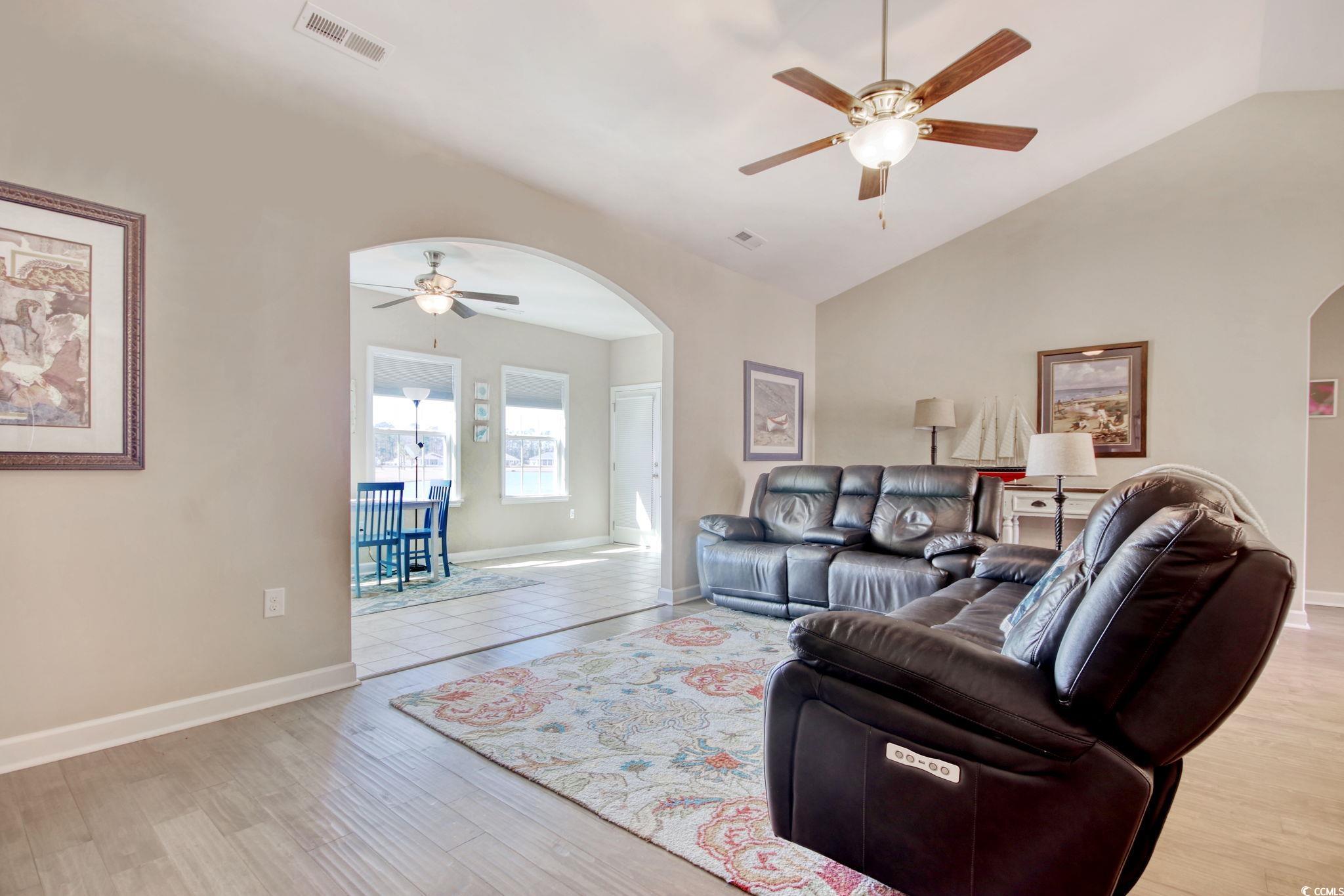434 Carrick Loop Longs, SC 29568 - Photo 13 of 39 Living room featuring ceiling fan, light wood-type