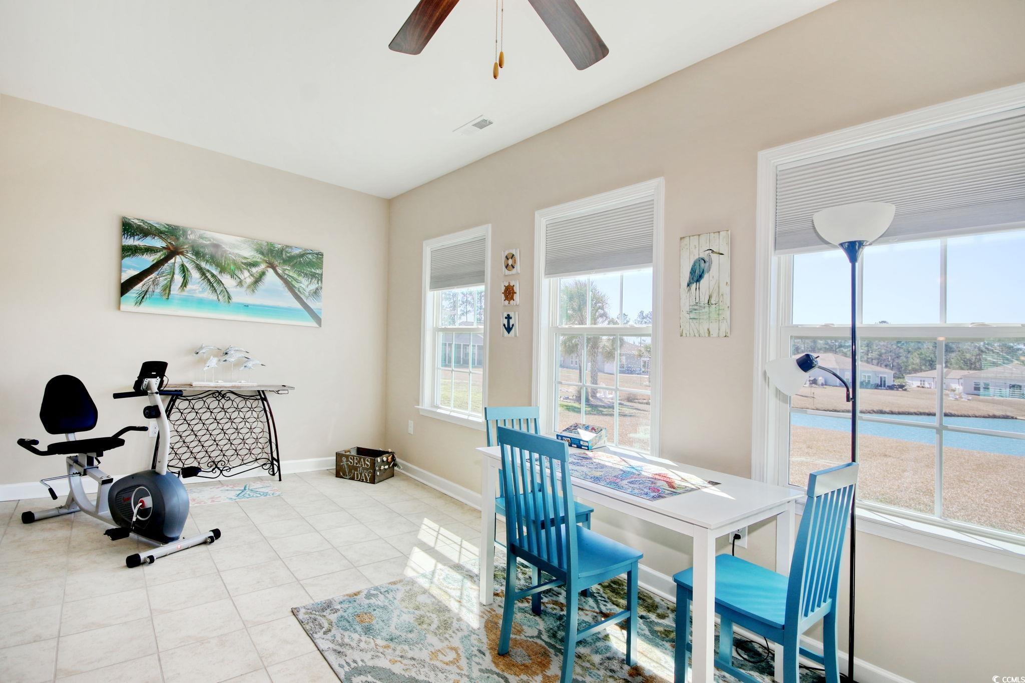 434 Carrick Loop Longs, SC 29568 - Photo 16 of 39 Exercise room with ceiling fan and light tile patt