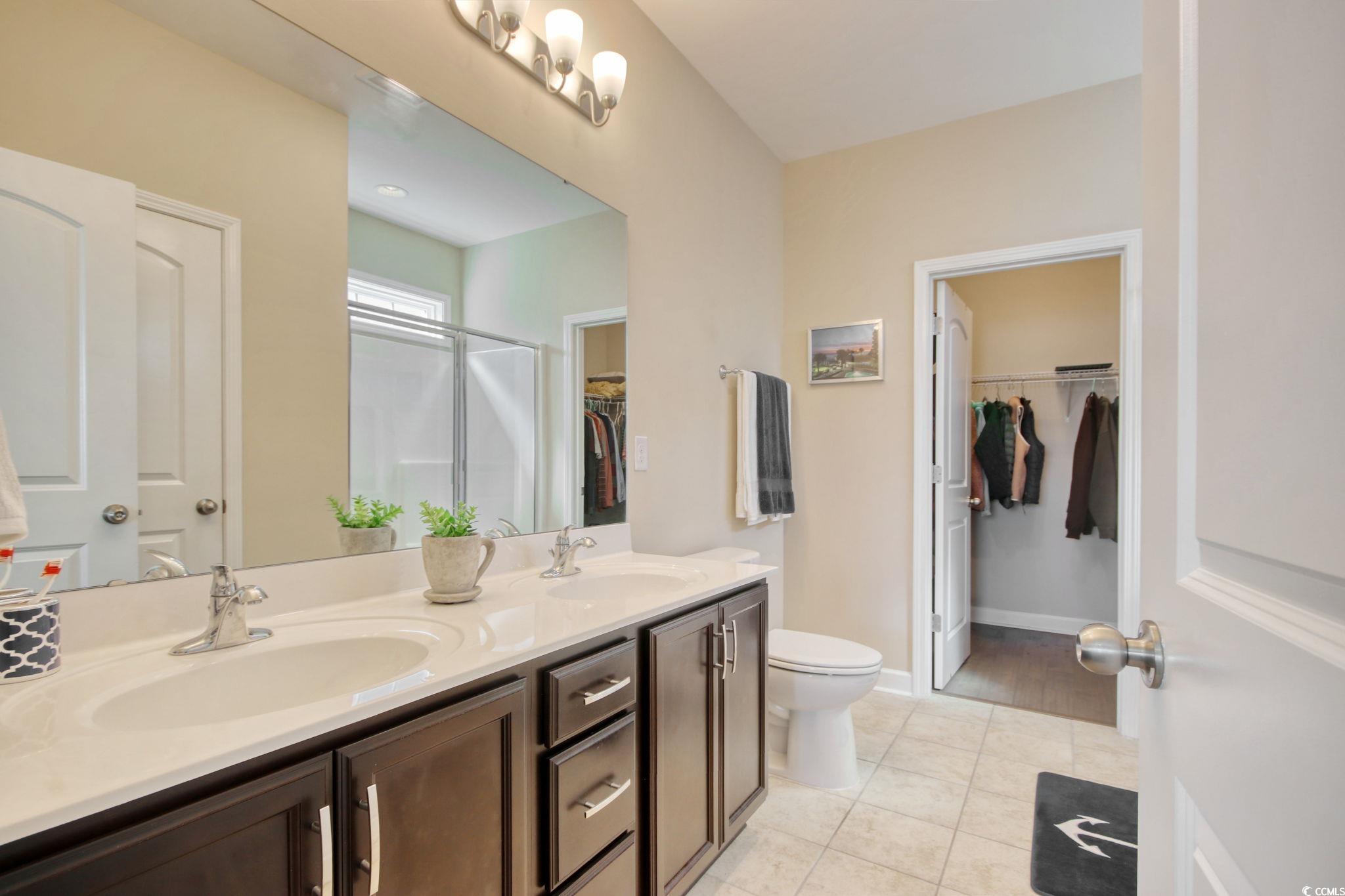 434 Carrick Loop Longs, SC 29568 - Photo 22 of 39 Bathroom featuring tile patterned floors, toilet,