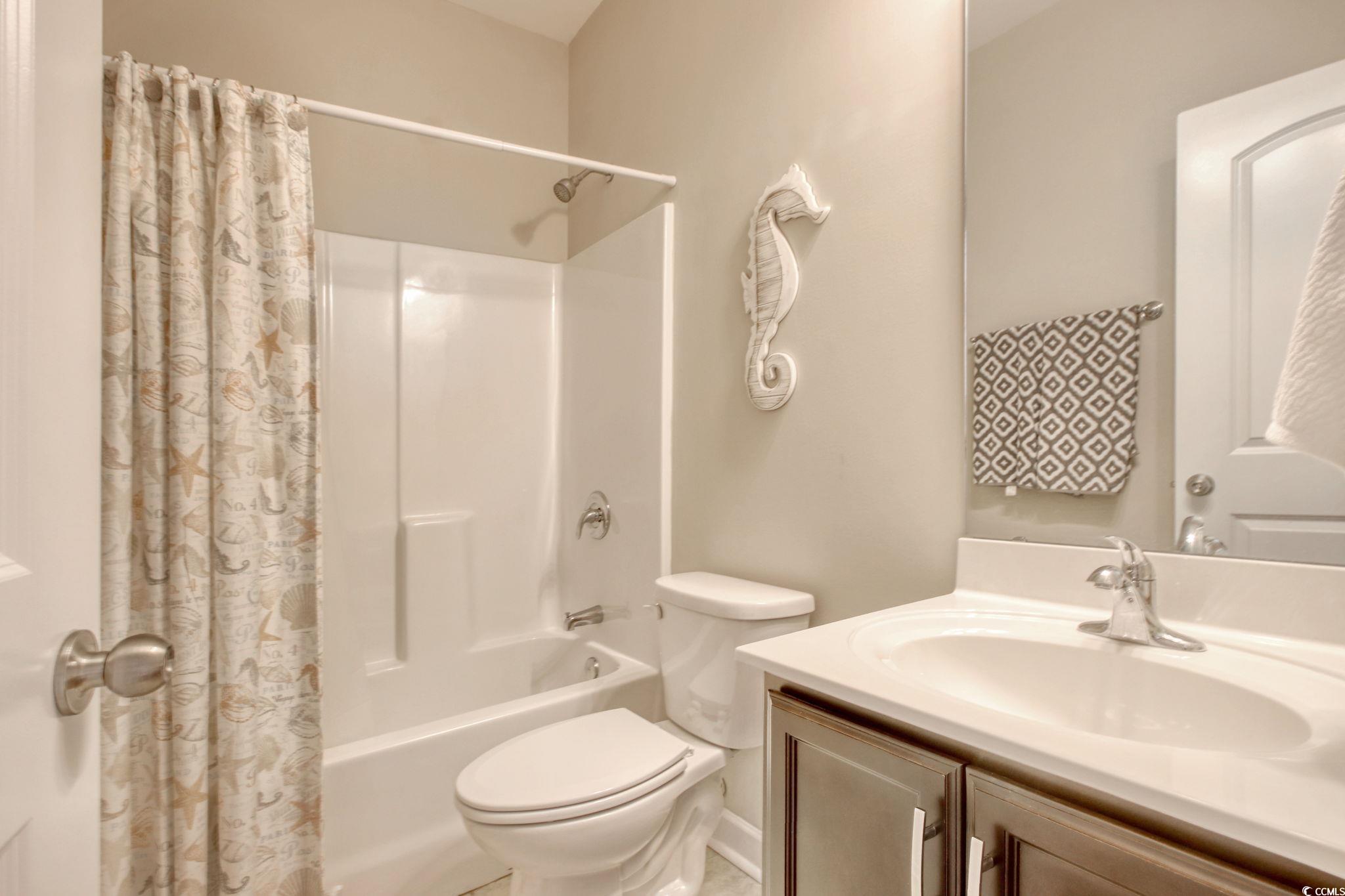 434 Carrick Loop Longs, SC 29568 - Photo 27 of 39 Full bathroom with toilet, shower / bath combo wit
