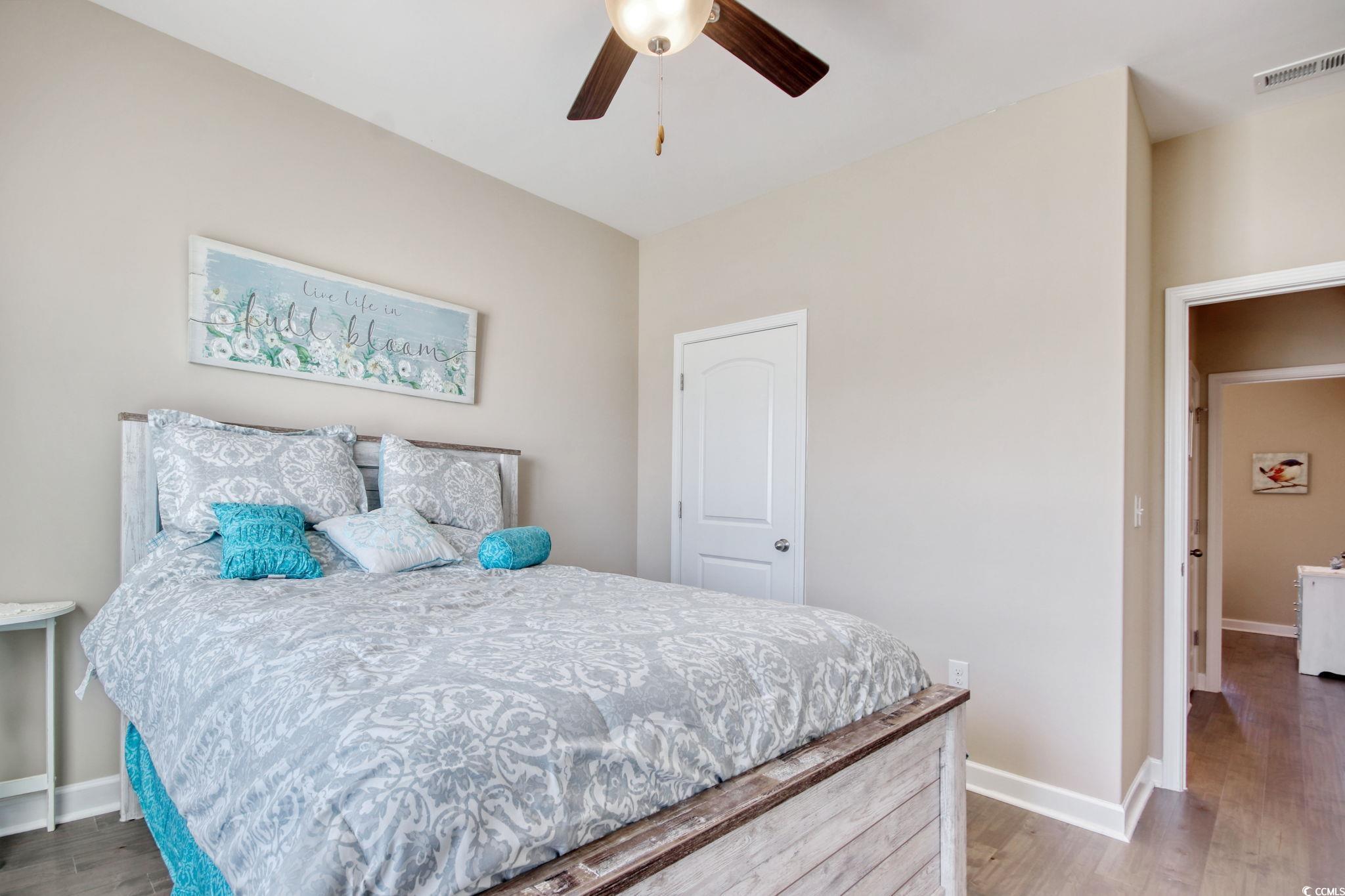 434 Carrick Loop Longs, SC 29568 - Photo 29 of 39 Bedroom with ceiling fan and hardwood / wood-style
