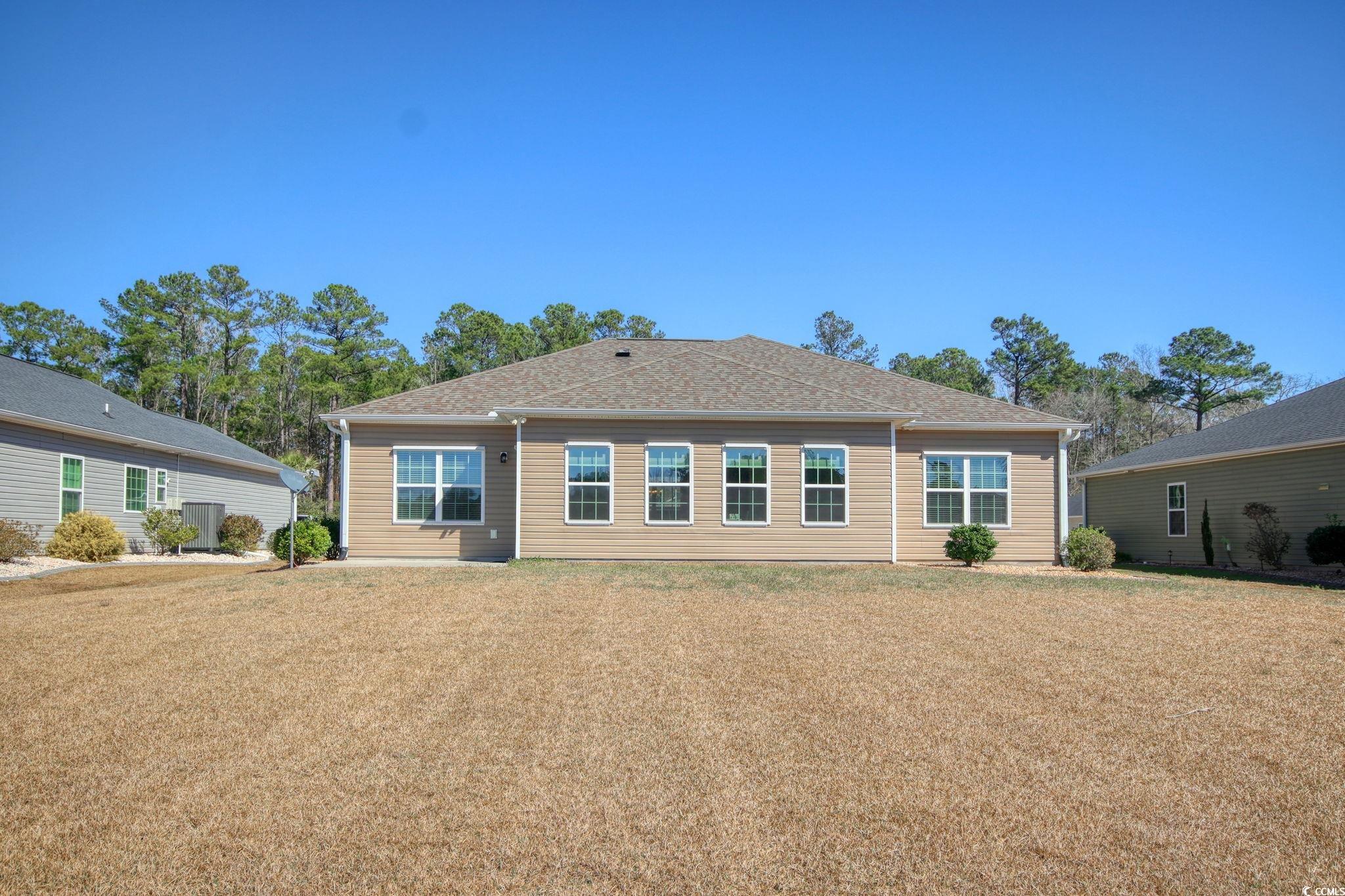 434 Carrick Loop Longs, SC 29568 - Photo 35 of 39 Exterior space with a front lawn