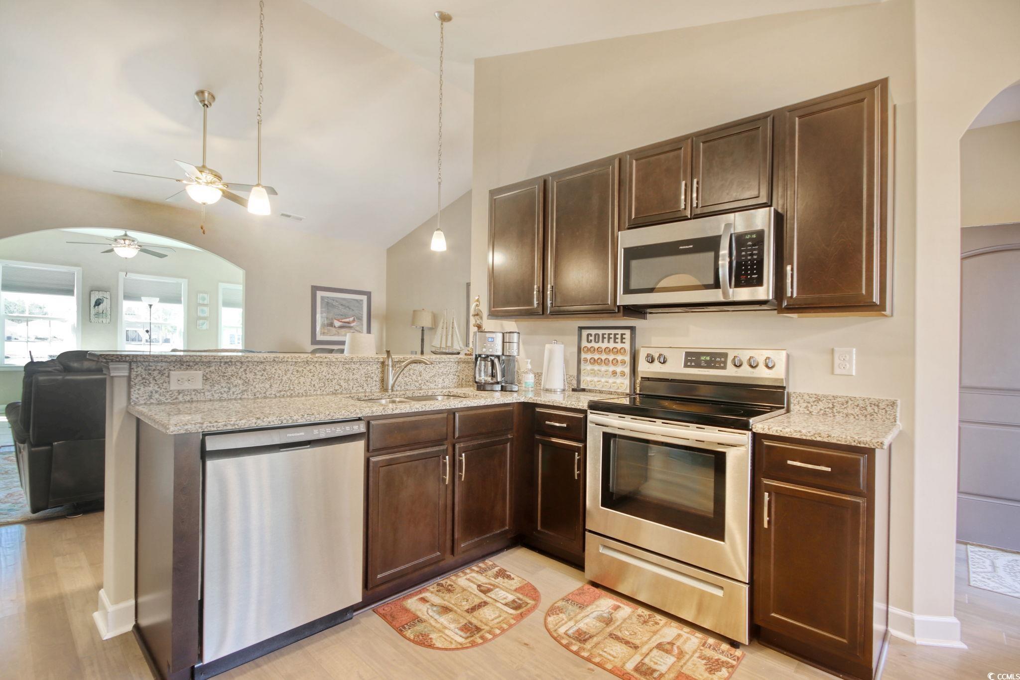 434 Carrick Loop Longs, SC 29568 - Photo 9 of 39 Kitchen featuring sink, kitchen peninsula, stainle