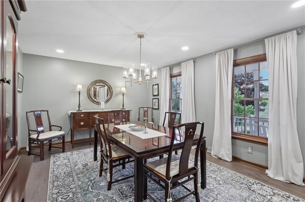 111 American School Road Harmony, PA 16037 - Photo 14 of 46 a view of a dining room with furniture window and wooden floor
