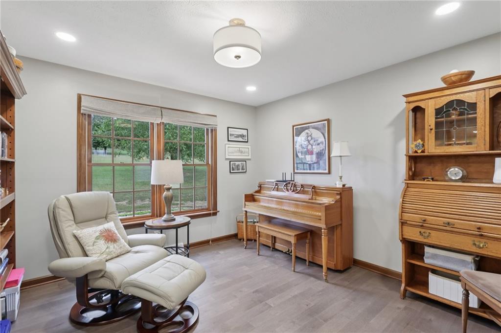 111 American School Road Harmony, PA 16037 - Photo 16 of 46 a living room with furniture and a window