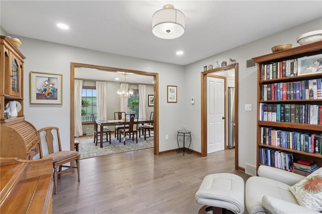 111 American School Road Harmony, PA 16037 - Photo 17 of 46 a living room with furniture and a book shelf
