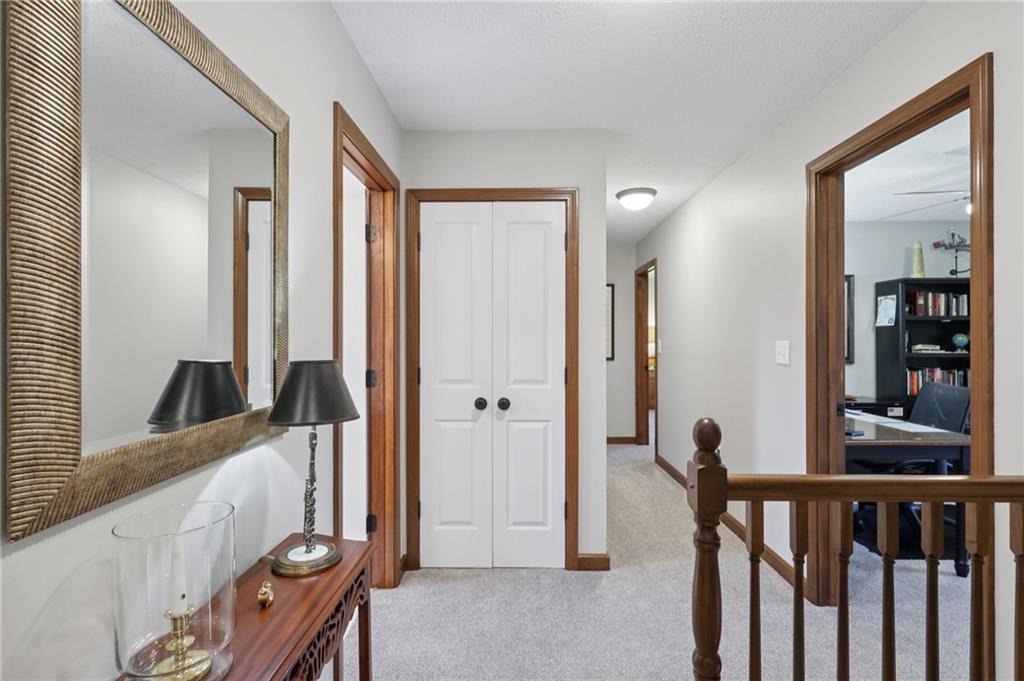 111 American School Road Harmony, PA 16037 - Photo 22 of 46 a view of a hallway with wooden floor and staircase