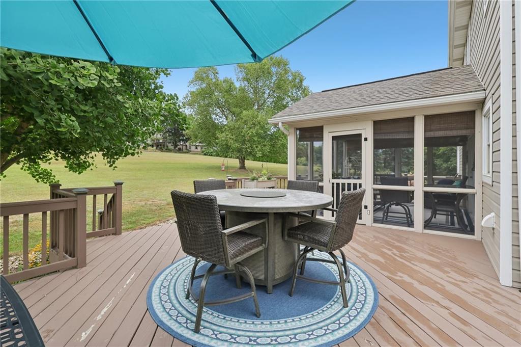 111 American School Road Harmony, PA 16037 - Photo 32 of 46 a dining room with furniture and wooden floor